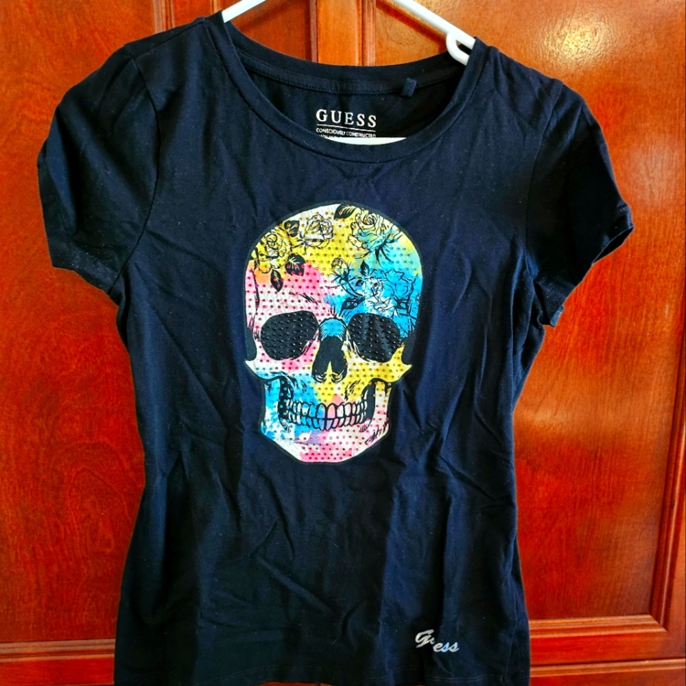Guess t-shirt, size medium. Black with colorful skull face.